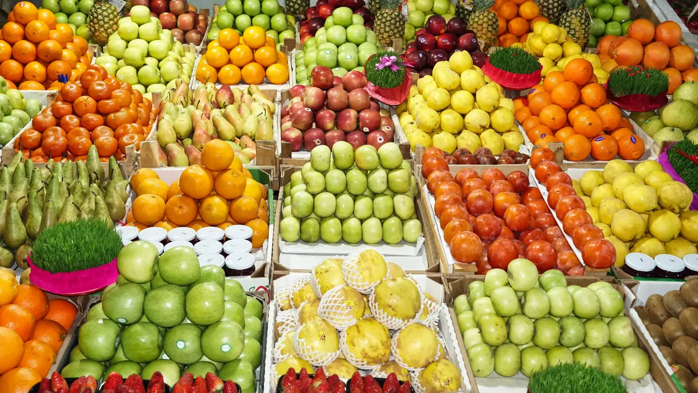 Assorted fresh fruit displayed by category