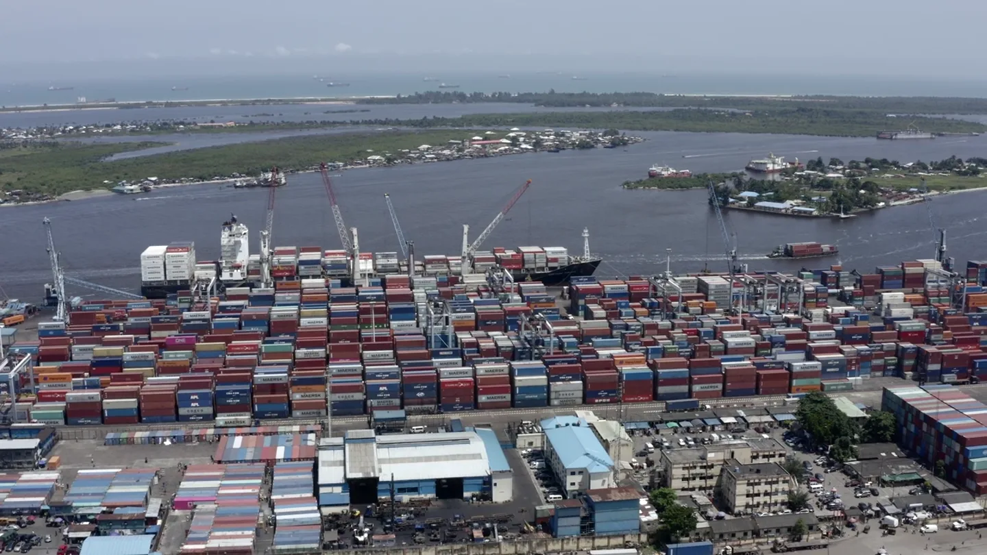 Aerial view of cargo containers and port infrastructure